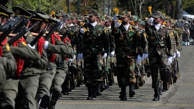 Iranian army members march during Army Day parade at a military base in northern Tehran, (AP) Iranian army members march during Army Day parade at a military base in northern Tehran, (AP)