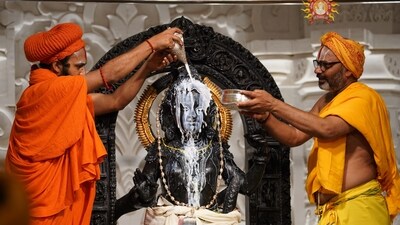 Priests perform 'abhishek' of Ram Lalla on the occasion of 'Ram Navami' festival, at the Ram Temple in Ayodhya. (PTI) Priests perform 'abhishek' of Ram Lalla on the occasion of 'Ram Navami' festival, at the Ram Temple in Ayodhya. (PTI)