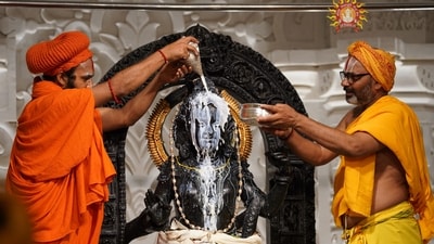 Priests perform 'abhishek' of Ram Lalla on the occasion of 'Ram Navami' festival, at the Ram Temple in Ayodhya on April 17. (PTI) Priests perform 'abhishek' of Ram Lalla on the occasion of 'Ram Navami' festival, at the Ram Temple in Ayodhya on April 17. (PTI)