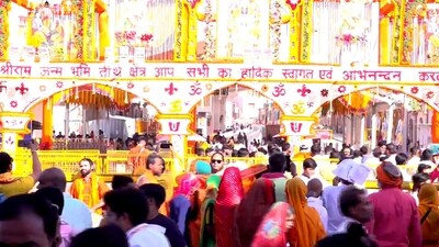 Before visiting the temple, devotees took a dip in the holy waters of the Saryu River. The darshan at the temple had started at 3:30 am. (PTI) Before visiting the temple, devotees took a dip in the holy waters of the Saryu River. The darshan at the temple had started at 3:30 am. (PTI)
