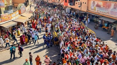 Devotees started flocking to the ghats at night. 'Darshan' started at Ram Temple at 3:30 am, according to officials. (PTI) Devotees started flocking to the ghats at night. 'Darshan' started at Ram Temple at 3:30 am, according to officials. (PTI)