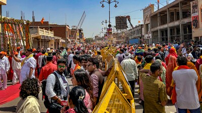 Devotees arrive to offer prayers at the Ram Temple on the occasion of 'Ram Navami' festival, in Ayodhya. (PTI) Devotees arrive to offer prayers at the Ram Temple on the occasion of 'Ram Navami' festival, in Ayodhya. (PTI)