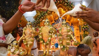 Priests give a holy bath to the idols of Lord Ram, Goddess Sita, Lord Lakshman and Lord Hanuman with a ‘shankh’ at ISKCON temple on the occasion of the Ram Navami festival, in Patna. (PTI) Priests give a holy bath to the idols of Lord Ram, Goddess Sita, Lord Lakshman and Lord Hanuman with a ‘shankh’ at ISKCON temple on the occasion of the Ram Navami festival, in Patna. (PTI)