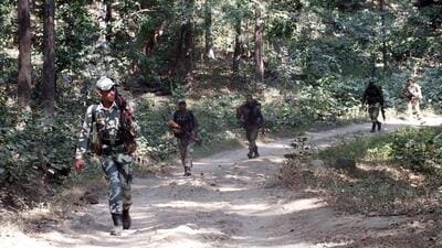 Paramilitary forces patrol a Maoist-affected area. (HT File Photo) Paramilitary forces patrol a Maoist-affected area. (HT File Photo)