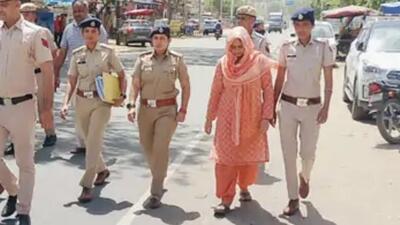 The school principal being brought to court on Wednesday. (HT Photo) The school principal being brought to court on Wednesday. (HT Photo)