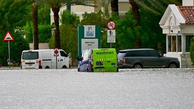 Vehicles are stranded on a flooded street following torrential rain in the Gulf Emirate of Dubai on April 16, 2024. (AFP) Vehicles are stranded on a flooded street following torrential rain in the Gulf Emirate of Dubai on April 16, 2024. (AFP)