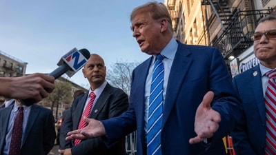 Donald Trump visited the bodega after spending a second day in court where he faces 34 felony counts of falsifying business records in the first of his criminal cases to go to trial.(Photo by SPENCER PLATT / GETTY IMAGES NORTH AMERICA / Getty Images via AFP) (Getty Images via AFP)