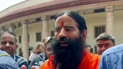 Yoga guru and brand ambassador Patanjali Ayurved Baba Ramdev speaks to the media as he leaves from the Supreme Court after attending an hearing relating to alleged misleading advertisements by Patanjali Ayurved, in New Delhi on Tuesday (ANI) Yoga guru and brand ambassador Patanjali Ayurved Baba Ramdev speaks to the media as he leaves from the Supreme Court after attending an hearing relating to alleged misleading advertisements by Patanjali Ayurved, in New Delhi on Tuesday (ANI)