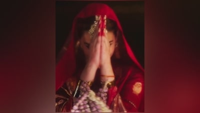 Coming to the sindoori red lehenga, the Manish Malhotra traditional outfit features a short kurti-styled blouse, lehenga skirt and dupatta. The Banarasi silk choli features gold brocade embroidery in rose pattern, half-length sleeves, a round neckline, broad gold embroidered borders, and a fitted silhouette.&nbsp; (Instagram)
