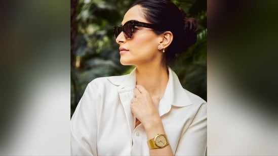 With nude lipstick, mascaraed lashes, contoured cheekbones, blushed cheeks, dewy base, nude lipstick and her tresses pulled back in a neat bun, she completed her stylish look. (Instagram/@sonamkapoor)
