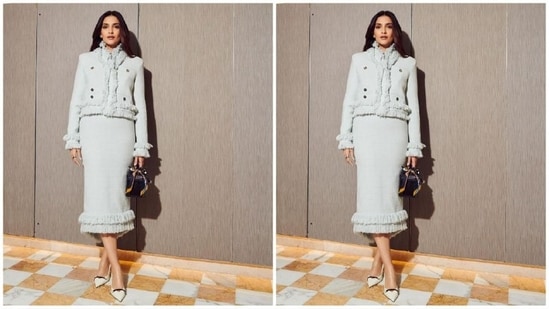 Her chic outfit is from the shelves of fashion brand Huishan Zhang and features a captivating white shade, a full-sleeved jacket with ruffled detailing and notched lapels. She paired it with a matching pencil skirt to add a touch of oomph.(Instagram/@sonamkapoor)