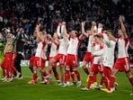 Bayern's players celebrate after the Champions League quarter-final second leg match