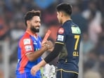 Rishabh Pant and Shubman Gill greet each other.