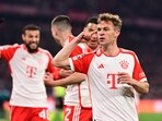 Bayern's Joshua Kimmich, right, celebrates with teammates after scoring his side's opening goal during the Champions League quarter final second leg Bayern's Joshua Kimmich, right, celebrates with teammates after scoring his side's opening goal during the Champions League quarter final second leg