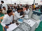 Election staff check the Electronic Voting Machines (EVM) at a polling station, ahead of the first phase of the election, in Bikaner, Rajasthan, India, April 18, 2024. REUTERS/Amit Dave