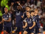 Real Madrid players react during a penalty shootout