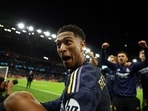 Real Madrid's Jude Bellingham celebrates after winning the match 