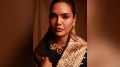 She accessorised her ethnic look with a pair of gold statement earrings and a heavy choker necklace to give it a less royal feel. With winged eyeliner, mascaraed lashes, lined cheekbones, blushed cheeks, nude lipstick and her hair tied up in a neat bun, she looked just wow. (Instagram/@egupta) She accessorised her ethnic look with a pair of gold statement earrings and a heavy choker necklace to give it a less royal feel. With winged eyeliner, mascaraed lashes, lined cheekbones, blushed cheeks, nude lipstick and her hair tied up in a neat bun, she looked just wow. (Instagram/@egupta)