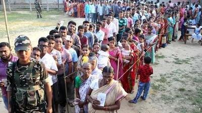 A Sashastra Seema Bal (SSB) trooper stands guard as people wait in queues to cast their votes outside a polling station during the third phase of general election in Khowai district in the northeastern state of Tripura, India, April 23, 2019. (Reuters/Jayanta Dey() A Sashastra Seema Bal (SSB) trooper stands guard as people wait in queues to cast their votes outside a polling station during the third phase of general election in Khowai district in the northeastern state of Tripura, India, April 23, 2019. (Reuters/Jayanta Dey()