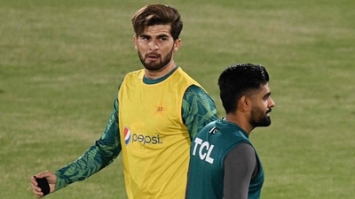 Pakistan's captain Babar Azam (R) and teammate Shaheen Shah Afridi (L) warm up during practice session. (AFP) Pakistan's captain Babar Azam (R) and teammate Shaheen Shah Afridi (L) warm up during practice session. (AFP)