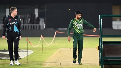 Pakistan's captain Babar Azam (R) and his New Zealand's counterpart Michael Bracewell (L) inspect the pitch before the unveiling of the T20I series trophy at the Rawalpindi Cricket Stadium in Rawalpindi. (AFP) Pakistan's captain Babar Azam (R) and his New Zealand's counterpart Michael Bracewell (L) inspect the pitch before the unveiling of the T20I series trophy at the Rawalpindi Cricket Stadium in Rawalpindi. (AFP)