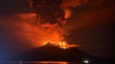 A volcano erupted several times in Indonesia's outermost region overnight on April 17, forcing hundreds of people to be evacuated after it spewed lava and a column of smoke more than a mile into the sky. (AFP) A volcano erupted several times in Indonesia's outermost region overnight on April 17, forcing hundreds of people to be evacuated after it spewed lava and a column of smoke more than a mile into the sky. (AFP)
