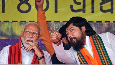 Prime Minister Narendra Modi with Union Minister and BJP candidate Nisith Pramanik during an election campaign rally in Coochbehar. (PTI) Prime Minister Narendra Modi with Union Minister and BJP candidate Nisith Pramanik during an election campaign rally in Coochbehar. (PTI)