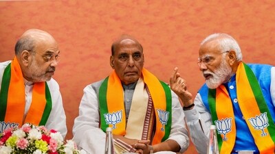 New Delhi: Prime Minister Narendra Modi, Defence Minister Rajnath Singh and Union Home Minister Amit Shah during the release of BJP's election manifesto �Sankalp Patra� for the Lok Sabha polls, at the party headquarters, in New Delhi, Sunday, April 14, 2024. (PTI Photo/Shahbaz Khan) New Delhi: Prime Minister Narendra Modi, Defence Minister Rajnath Singh and Union Home Minister Amit Shah during the release of BJP's election manifesto �Sankalp Patra� for the Lok Sabha polls, at the party headquarters, in New Delhi, Sunday, April 14, 2024. (PTI Photo/Shahbaz Khan)