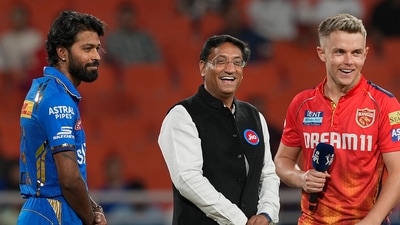 Mumbai Indians captain Hardik Pandya and Punjab Kings stand-in captain Sam Curran during the toss ceremony (PTI) Mumbai Indians captain Hardik Pandya and Punjab Kings stand-in captain Sam Curran during the toss ceremony (PTI)