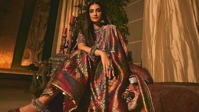 Sonam A Kapoor wore a skirt, blouse and dupatta set made from vintage old Banarasi saree featuring antique embroidery from Jigya Patel. She paired it with 80-year-old antique jewellery (Photo: Instagram) Sonam A Kapoor wore a skirt, blouse and dupatta set made from vintage old Banarasi saree featuring antique embroidery from Jigya Patel. She paired it with 80-year-old antique jewellery (Photo: Instagram)