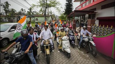 Supporters of the Indian National Congress hold a motorbike rally ahead of the national parliamentary elections in Jorhat, Assam India, on Wednesday (Photo for representative purpose only). (AP) Supporters of the Indian National Congress hold a motorbike rally ahead of the national parliamentary elections in Jorhat, Assam India, on Wednesday (Photo for representative purpose only). (AP)
