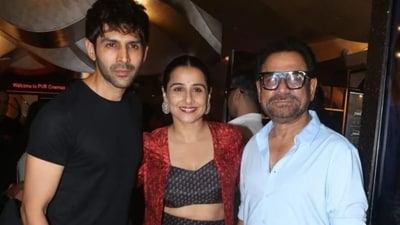Kartik Aaryan and Vidya Balan with their Bhool Bhulaiyaa 3 director Anees Bazmee Kartik Aaryan and Vidya Balan with their Bhool Bhulaiyaa 3 director Anees Bazmee