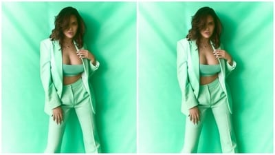 Her stylish outfit is from the shelves of the clothing brand BOSS and features a fitted blazer with power shoulders, full sleeves, and a double collar. She teamed it with a pair of matching high-waisted trousers. Inside, she wore a matching bralette for a chic look. (Instagram/@egupta) Her stylish outfit is from the shelves of the clothing brand BOSS and features a fitted blazer with power shoulders, full sleeves, and a double collar. She teamed it with a pair of matching high-waisted trousers. Inside, she wore a matching bralette for a chic look. (Instagram/@egupta)