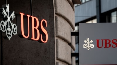 Signs of Swiss bank giant UBS bank are seen in Basel. (AFP)