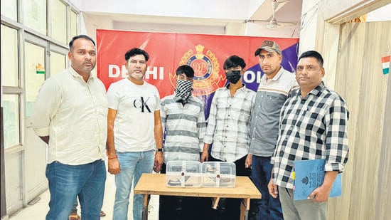 The two adult accused in police custody. One minor has been apprehended in the day light murder, police said. (HT Photo)