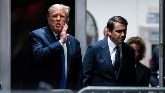 Former President Donald Trump speaks alongside attorney Todd Blanche as they return from a lunch break in his trial at Manhattan criminal court in New York on Thursday, April 18, 2024. (Jabin Botsford/The Washington Post via AP, Pool) (AP)