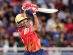 Punjab Kings' Shashank Singh plays a shot during their match against Mumbai Indians