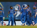 Mumbai Indians players celebrate their win. Mumbai Indians players celebrate their win.