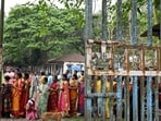People outside a polling booth in West Bengal’s Cooch Behar. (AFP) People outside a polling booth in West Bengal’s Cooch Behar. (AFP)