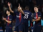 Paris St Germain's Kylian Mbappe acknowledges fans.