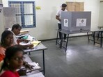 A voter casts a ballot at a polling station during the first phase of voting for national elections in Chennai, Tamil Nadu on April 19. A voter casts a ballot at a polling station during the first phase of voting for national elections in Chennai, Tamil Nadu on April 19.