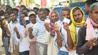 Gaya, Bihar, India -Apri .19, 2024: Voters in queue for casting their votes at a polling booth during Lok Sabha election in Gaya, Bihar, India, Friday,19, 2024. (HT Photo)