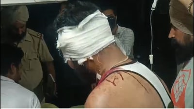 An injured inmate in hospital.