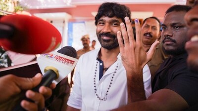 Dhanush was all smiles after casting his vote, happily chatting with reporters and giving them sound bytes. (X/Cyril Eanastein) Dhanush was all smiles after casting his vote, happily chatting with reporters and giving them sound bytes. (X/Cyril Eanastein)