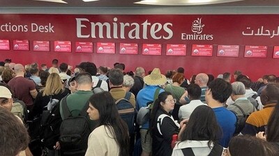 People queue at a flight connection desk after a rainstorm hit Dubai, causing delays at the Dubai International Airport, United Arab Emirates on April 17. (REUTERS)