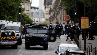 French police and members of French special police forces of Research and Intervention Brigade (BRI) secure the area near Iran consulate where a man is threatening to blow himself up, in Paris, France, April 19, 2024. (REUTERS)