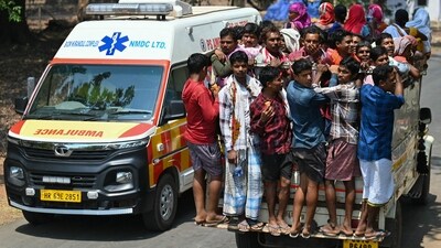 Voters leave on a truck after casting their ballot during the first phase of voting for the India's general election, in Dugeli village of Dantewada district of Chhattisgarh. (AFP)
