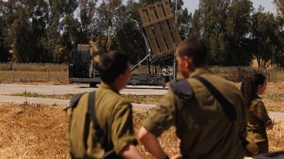 Israeli soldiers at an Iron Dome anti-missile battery site near the Gaza border in southern Israel on April 17, 2024. (Bloomberg) Israeli soldiers at an Iron Dome anti-missile battery site near the Gaza border in southern Israel on April 17, 2024. (Bloomberg)