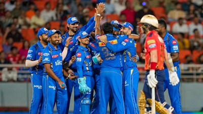 Mumbai Indians bowler Jasprit Bumrah with teammates celebrates the wicket of Punjab Kings batter Sam Curran (PTI) Mumbai Indians bowler Jasprit Bumrah with teammates celebrates the wicket of Punjab Kings batter Sam Curran (PTI)