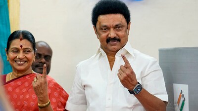 Tamil Nadu Chief Minister MK Stalin and his wife show their fingers marked with indelible ink after casting their votes for the first phase of Lok Sabha elections, at a polling station in Chennai. (PTI)